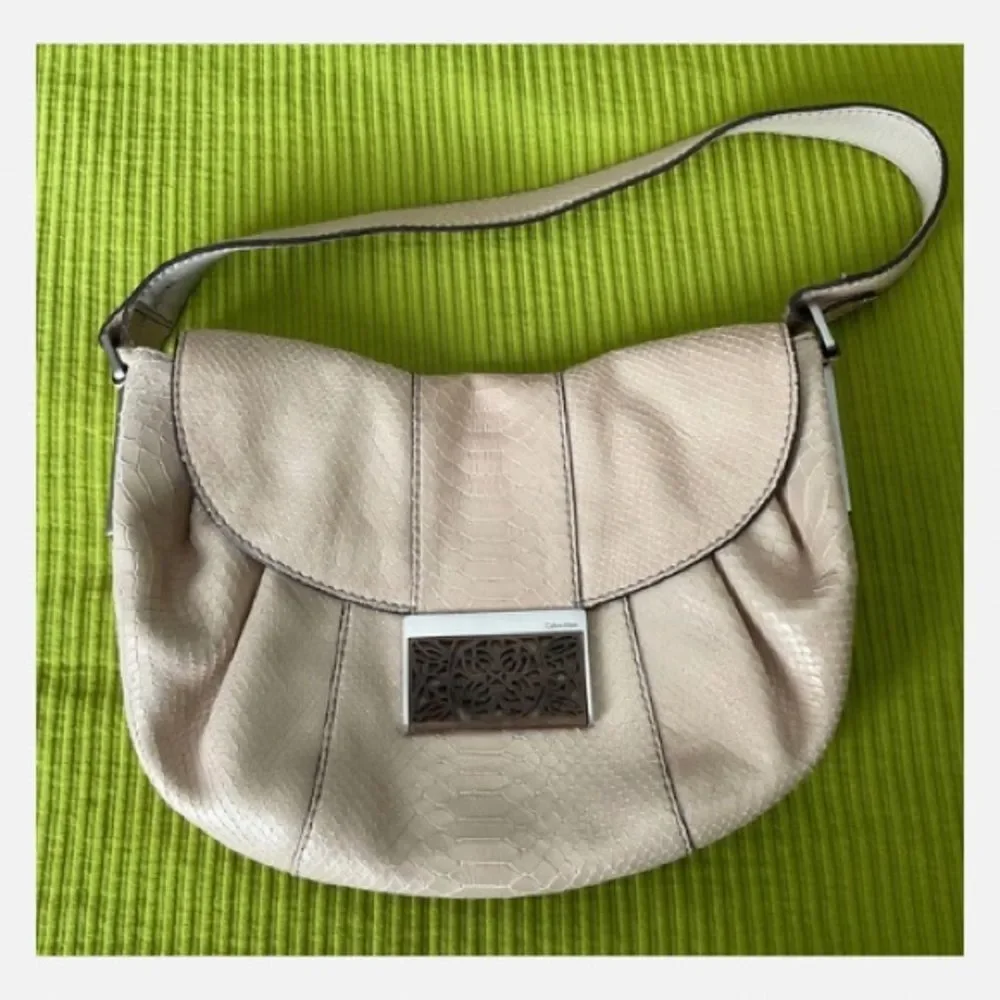Calvin Klein Vintage Hobo Shoulder Bag with Carved Wood Flap Closure